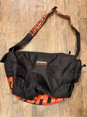 Superdry Black Messenger Bag with Orange Branding